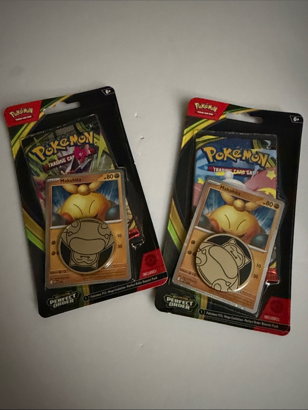 Pokemon Makuhita Gold Coin & Booster Pack - Black/Gold